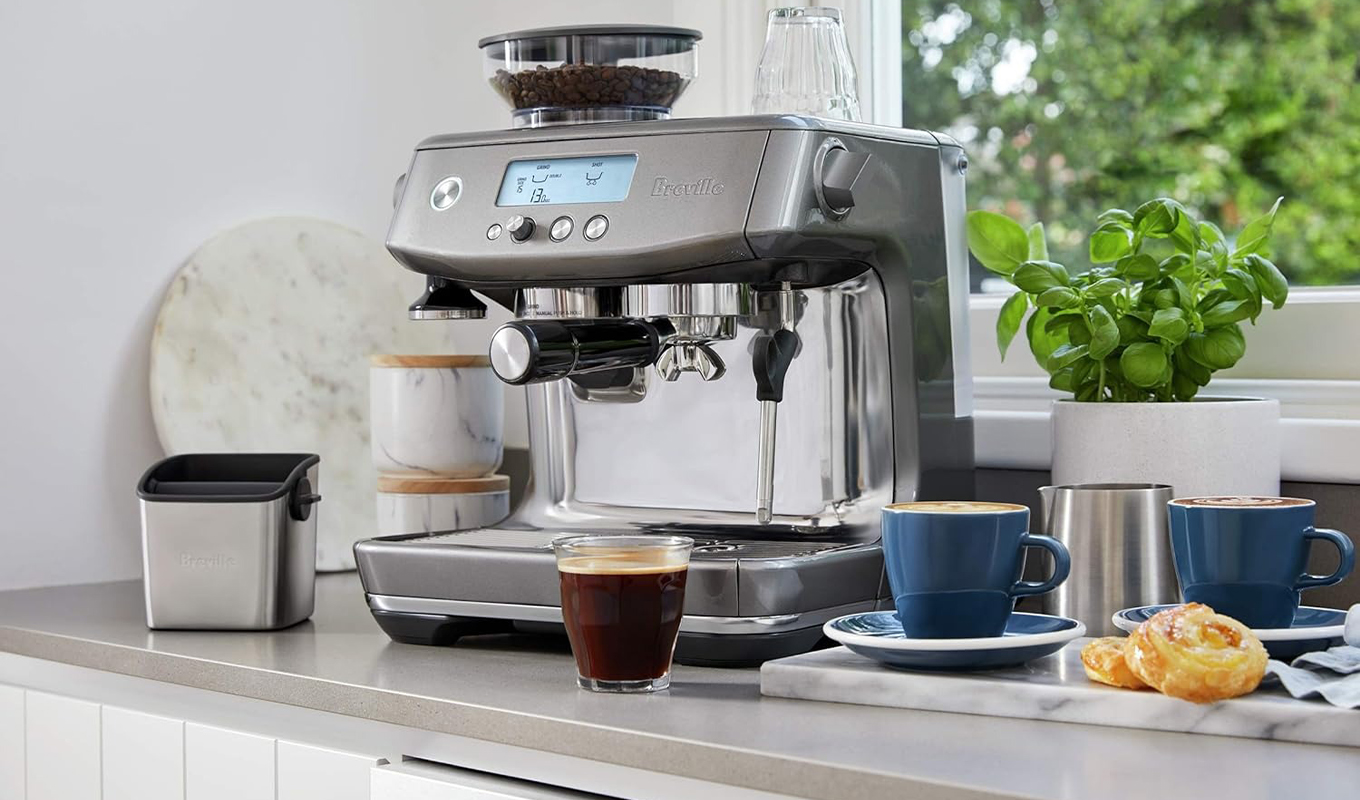 A close up of the Breville the Barista Pro Espresso Machine set up on a kitchen counter.